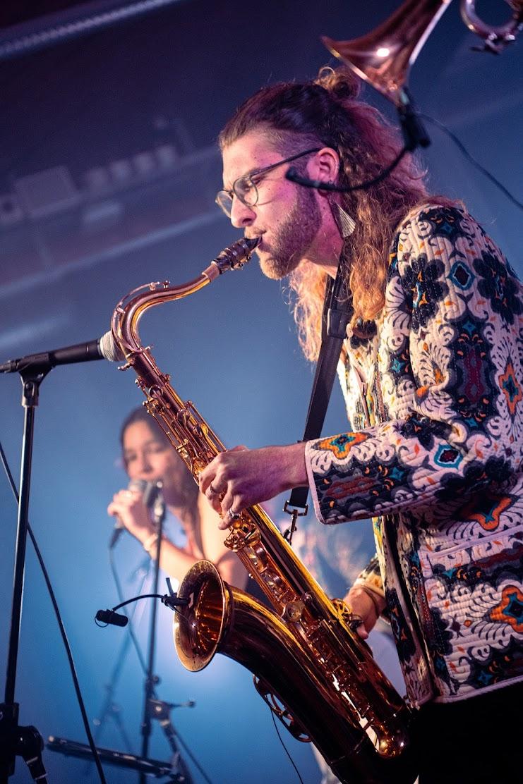 Linus, saxophonist and vocalist of Provincial Penguin Travel Agency